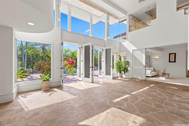 3124 Noela Dr, Honolulu, HI 96815 - entryway featuring stone flooring, a high ceiling, and recessed lighting