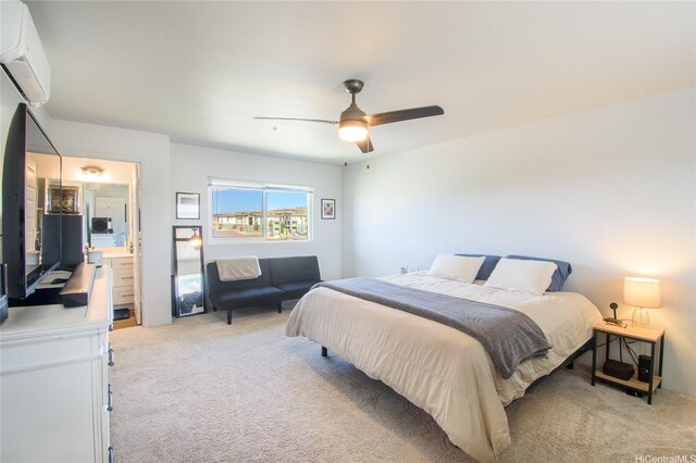 91-3525 Kauluakoko St Unit 2103, Ewa Beach, HI 96706 - bedroom with an AC wall unit, light colored carpet, ceiling fan, and ensuite bath