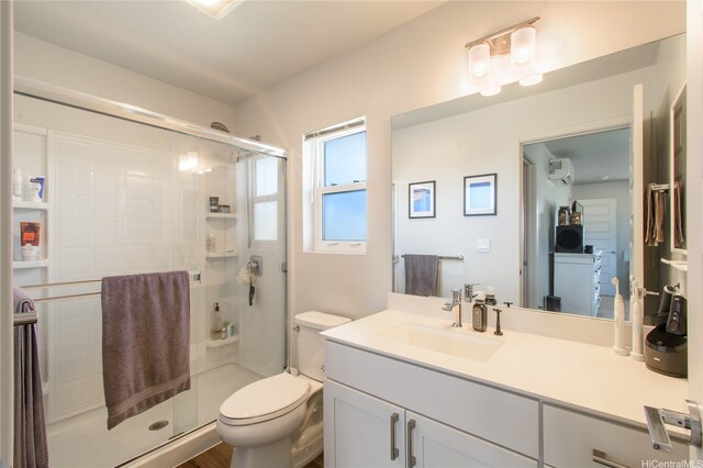 91-3525 Kauluakoko St Unit 2103, Ewa Beach, HI 96706 - bathroom with a stall shower, vanity, and a wall mounted air conditioner
