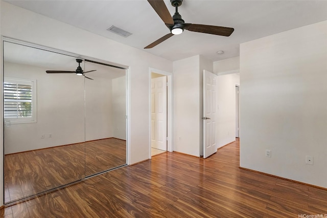 91-1023 Kaiee St, Ewa Beach, HI 96706 - unfurnished bedroom featuring wood finished floors, ceiling fan, and a closet