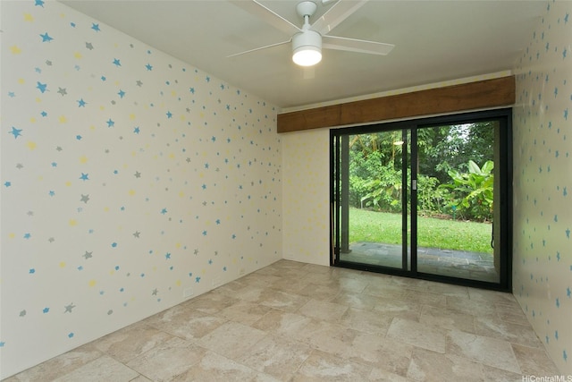 46-359 Haiku Rd Unit C10, Kaneohe, HI 96744 - empty room featuring wallpapered walls, a ceiling fan, and light stone finish floors