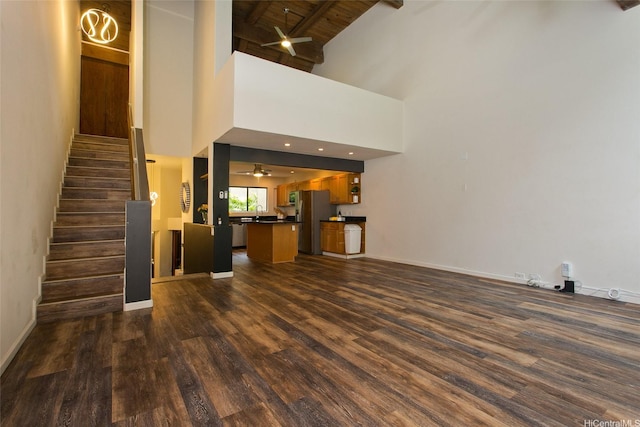 46-359 Haiku Rd Unit C10, Kaneohe, HI 96744 - unfurnished living room featuring a ceiling fan, dark wood finished floors, stairway, a wooden ceiling with exposed beams, and high vaulted ceiling