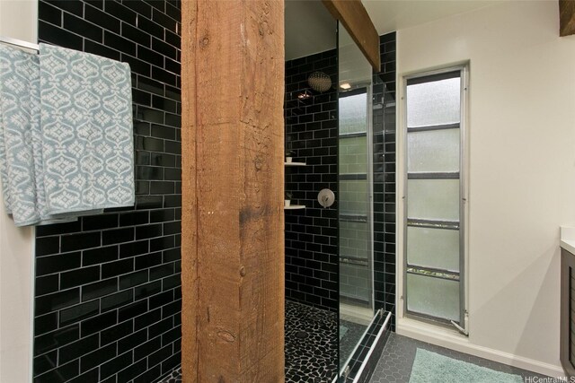 46-359 Haiku Rd Unit C10, Kaneohe, HI 96744 - bathroom with a tile shower, tile patterned floors, and vanity