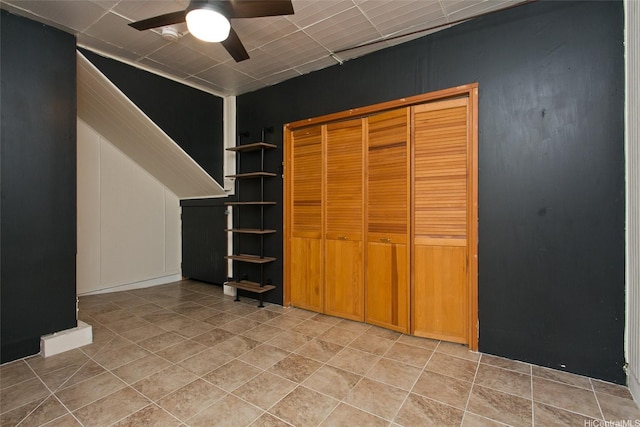 46-359 Haiku Rd Unit C10, Kaneohe, HI 96744 - unfurnished bedroom with light tile patterned flooring, a ceiling fan, and a closet