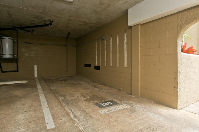 46-359 Haiku Rd Unit C10, Kaneohe, HI 96744 - parking deck with concrete block wall and a central vacuum unit