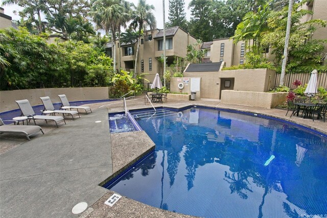 46-359 Haiku Rd Unit C10, Kaneohe, HI 96744 - community pool featuring a patio