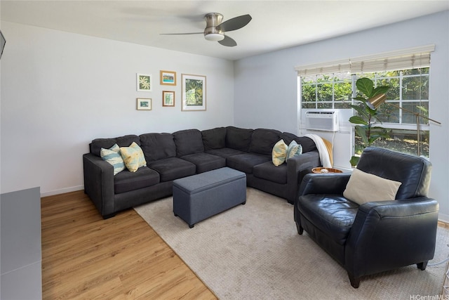 239 Mananai Pl Unit 54H, Honolulu, HI 96818 - living area with light wood-type flooring, cooling unit, and ceiling fan