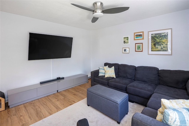 239 Mananai Pl Unit 54H, Honolulu, HI 96818 - living room with wood finished floors and a ceiling fan