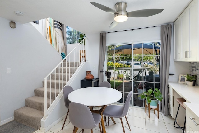 239 Mananai Pl Unit 54H, Honolulu, HI 96818 - dining space with ceiling fan, stairway, and light tile patterned floors