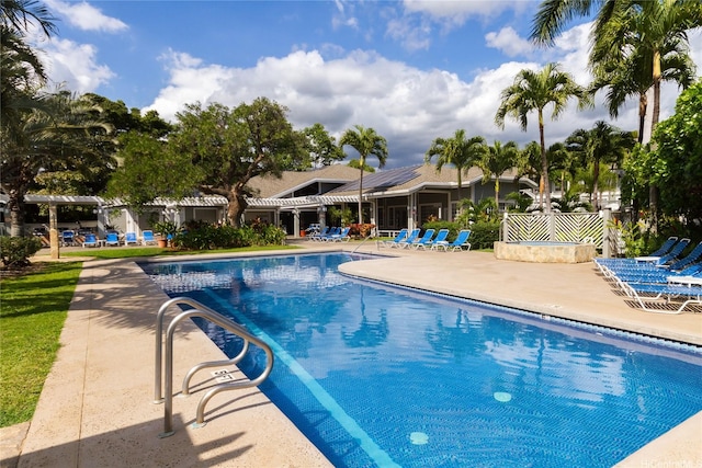 239 Mananai Pl Unit 54H, Honolulu, HI 96818 - community pool featuring a patio area