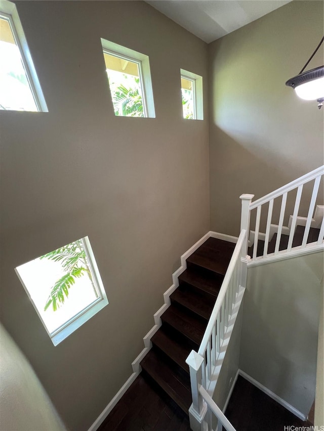 91-1035 Kaiko St, Ewa Beach, HI 96706 - stairway featuring wood finished floors and baseboards