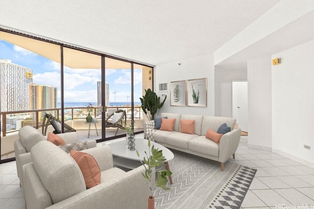 725 Kapiolani Blvd Unit 1802, Honolulu, HI 96813 - living room featuring light tile patterned flooring, floor to ceiling windows, a water view, and a textured ceiling