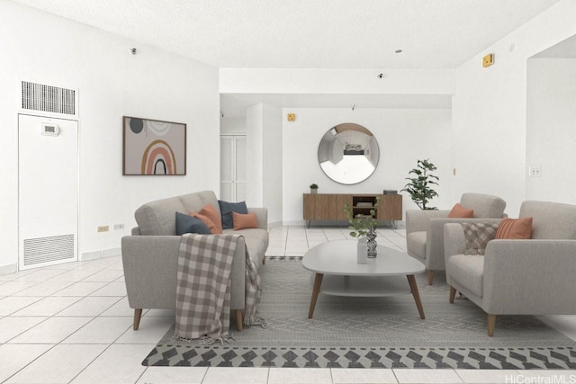 725 Kapiolani Blvd Unit 1802, Honolulu, HI 96813 - living area with light tile patterned floors, a heating unit, and a textured ceiling