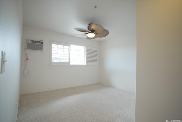 91-1271 Kamaaha Ave Unit 406, Kapolei, HI 96707 - carpeted spare room with a wall mounted AC and ceiling fan
