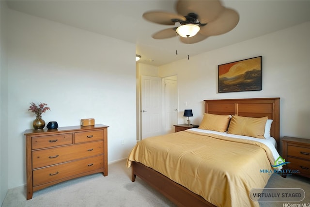 91-1271 Kamaaha Ave Unit 406, Kapolei, HI 96707 - bedroom featuring light carpet and a ceiling fan