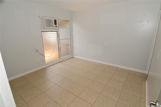 1028 Hooli Pl Unit A, Pearl City, HI 96782 - unfurnished room with light tile patterned floors and a wall mounted air conditioner