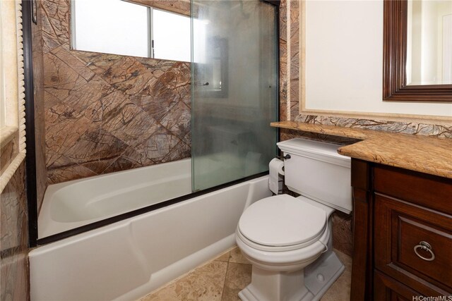 95-536 Wikao St Unit D106, Mililani, HI 96789 - bathroom featuring combined bath / shower with glass door, vanity, and tile patterned flooring