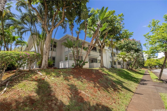 95-536 Wikao St Unit D106, Mililani, HI 96789 - view of side of property featuring stucco siding