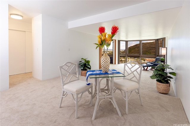 521 Hahaione St Unit 2/12H, Honolulu, HI 96825 - dining space with carpet