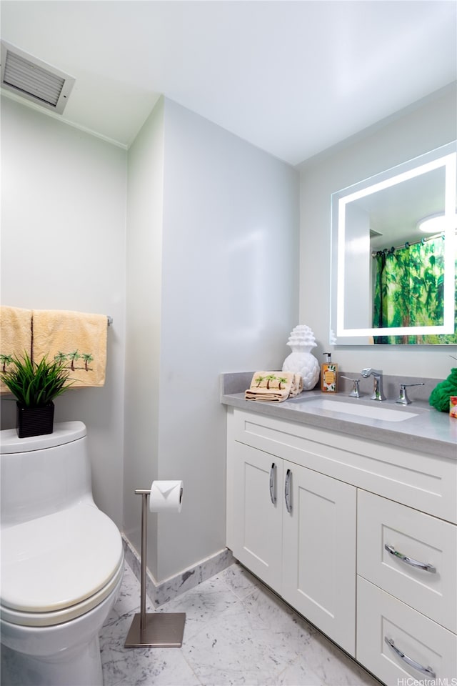 521 Hahaione St Unit 2/12H, Honolulu, HI 96825 - bathroom featuring vanity and toilet