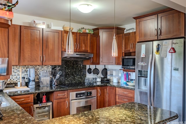 95-142 Kuahelani Ave Unit 251, Mililani, HI 96789 - kitchen with appliances with stainless steel finishes, under cabinet range hood, wine cooler, backsplash, and dark stone countertops