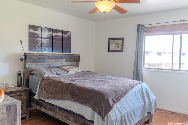 95-142 Kuahelani Ave Unit 251, Mililani, HI 96789 - bedroom with wood finished floors and ceiling fan