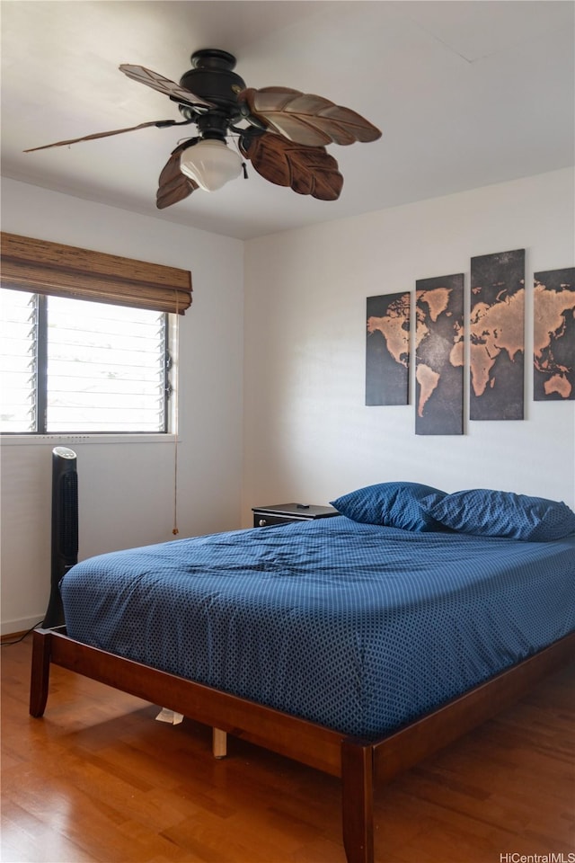 95-142 Kuahelani Ave Unit 251, Mililani, HI 96789 - bedroom with wood finished floors and a ceiling fan