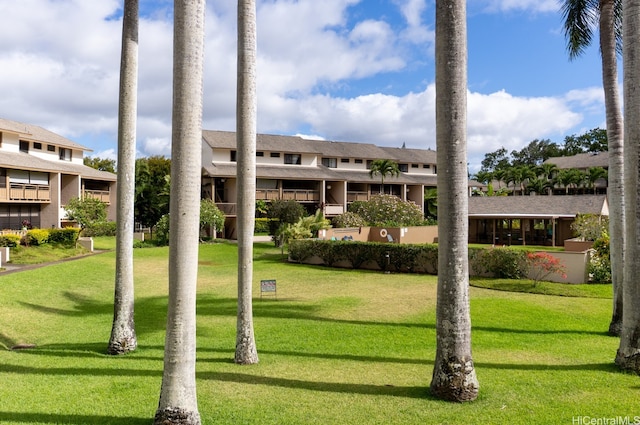 95-142 Kuahelani Ave Unit 251, Mililani, HI 96789 - surrounding community featuring a lawn