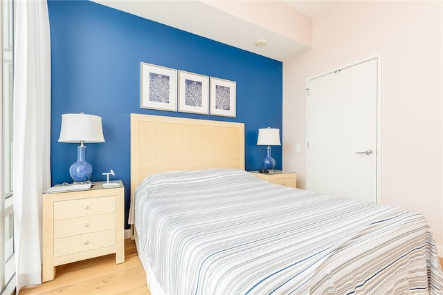 1001 Queen St Unit 3907, Honolulu, HI 96814 - bedroom with wood finished floors