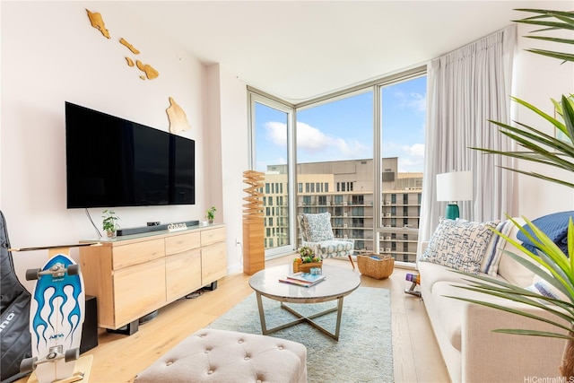 1001 Queen St Unit 3907, Honolulu, HI 96814 - living area featuring a wall of windows and light wood-style flooring