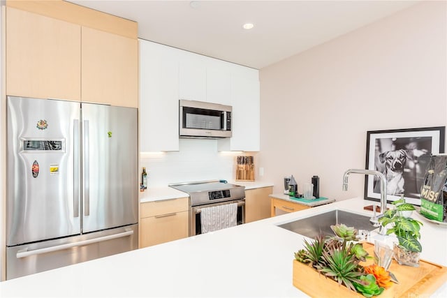 1001 Queen St Unit 3907, Honolulu, HI 96814 - kitchen featuring stainless steel appliances, light countertops, tasteful backsplash, modern cabinets, and recessed lighting