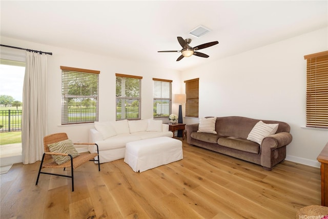 91-1144 Kaikohola St Unit D71, Ewa Beach, HI 96706 - living area featuring a ceiling fan, plenty of natural light, and light wood finished floors