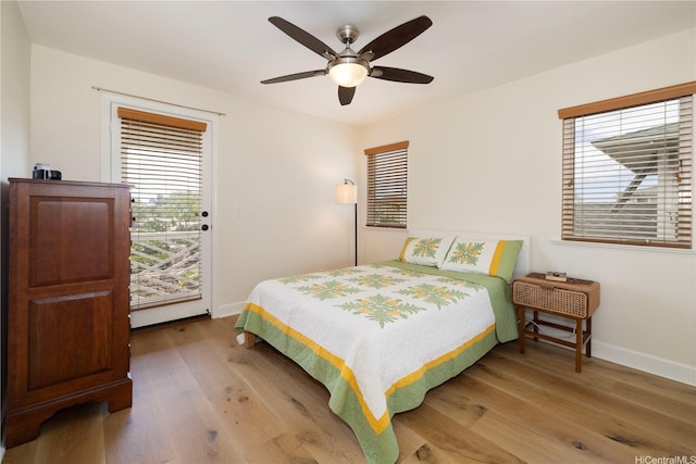 91-1144 Kaikohola St Unit D71, Ewa Beach, HI 96706 - bedroom with multiple windows, light wood-style floors, and ceiling fan