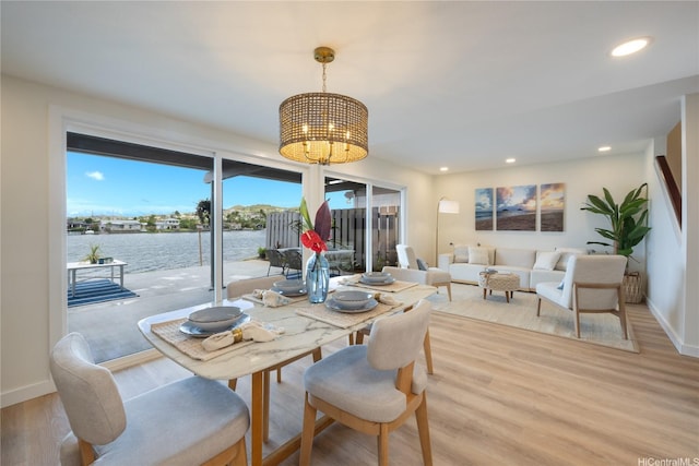 539 Keolu Dr Unit C, Kailua, HI 96734 - dining space featuring a chandelier, light wood finished floors, recessed lighting, and a water view