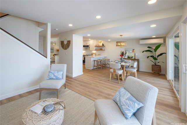 539 Keolu Dr Unit C, Kailua, HI 96734 - living area featuring a wall mounted AC, light wood finished floors, and recessed lighting