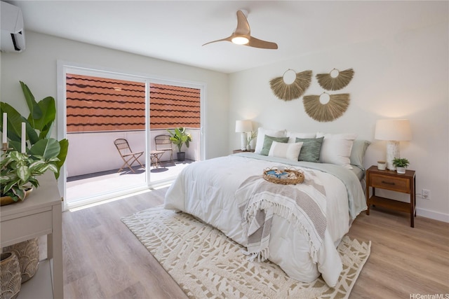 539 Keolu Dr Unit C, Kailua, HI 96734 - bedroom with a wall mounted air conditioner, light wood-style floors, access to outside, and a ceiling fan