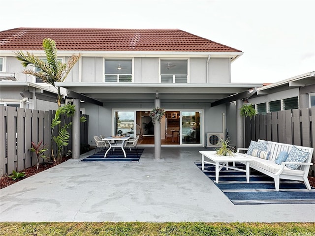 539 Keolu Dr Unit C, Kailua, HI 96734 - rear view of property with a patio, an outdoor hangout area, a tiled roof, and stucco siding