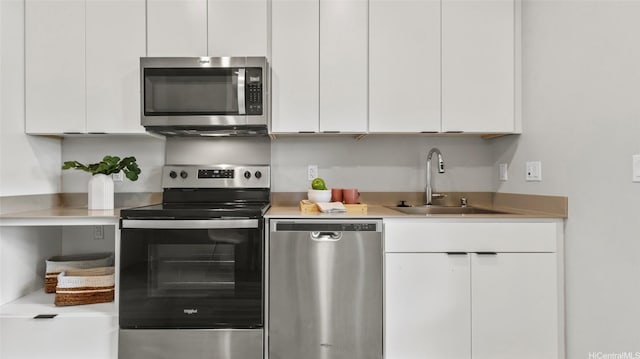 91-3617 Kamolehonua St Unit 208, Ewa Beach, HI 96706 - kitchen featuring stainless steel appliances, light countertops, white cabinetry, and modern cabinets