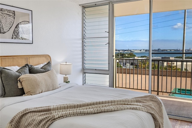 98-099 Uao Pl Unit 506, Aiea, HI 96701 - bedroom featuring a water view, wood finished floors, and access to outside