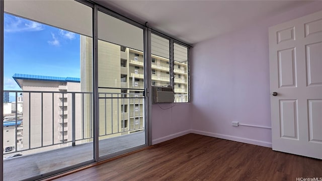 1121 Wilder Ave Unit 900B, Honolulu, HI 96822 - empty room featuring wood finished floors and cooling unit