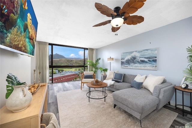 322 Aoloa St Unit 1110, Kailua, HI 96734 - living room featuring floor to ceiling windows, wood finished floors, and ceiling fan