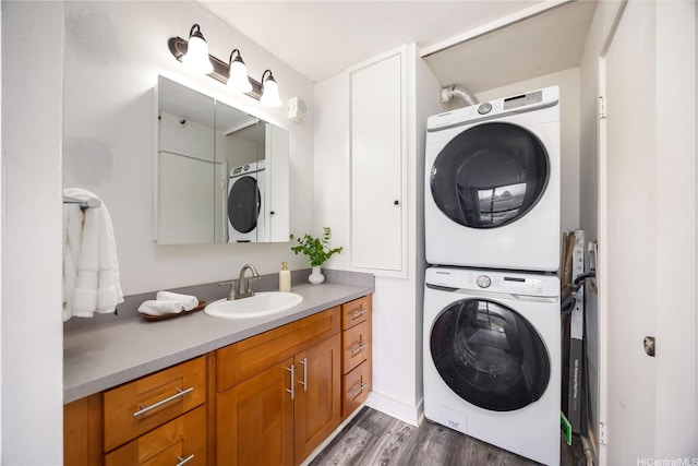 322 Aoloa St Unit 1110, Kailua, HI 96734 - bathroom with stacked washer / dryer, vanity, and wood finished floors