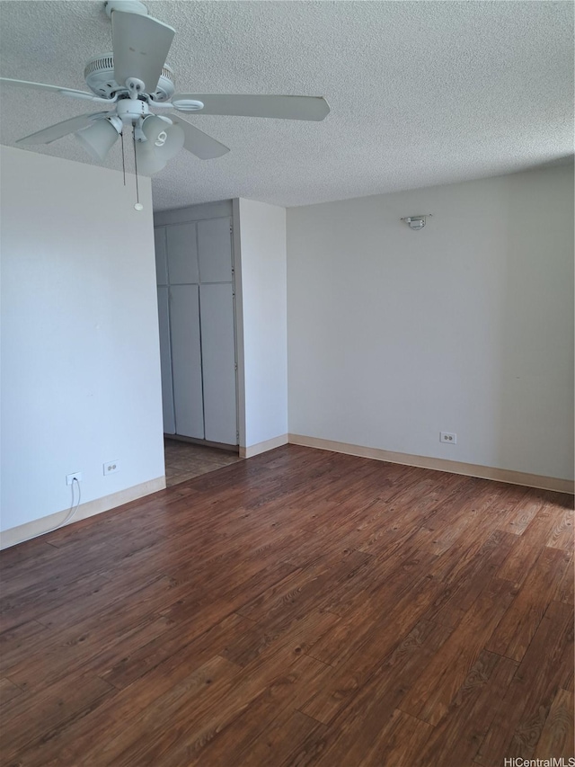 1650 Piikoi St Unit 403, Honolulu, HI 96822 - spare room with ceiling fan, wood finished floors, and a textured ceiling