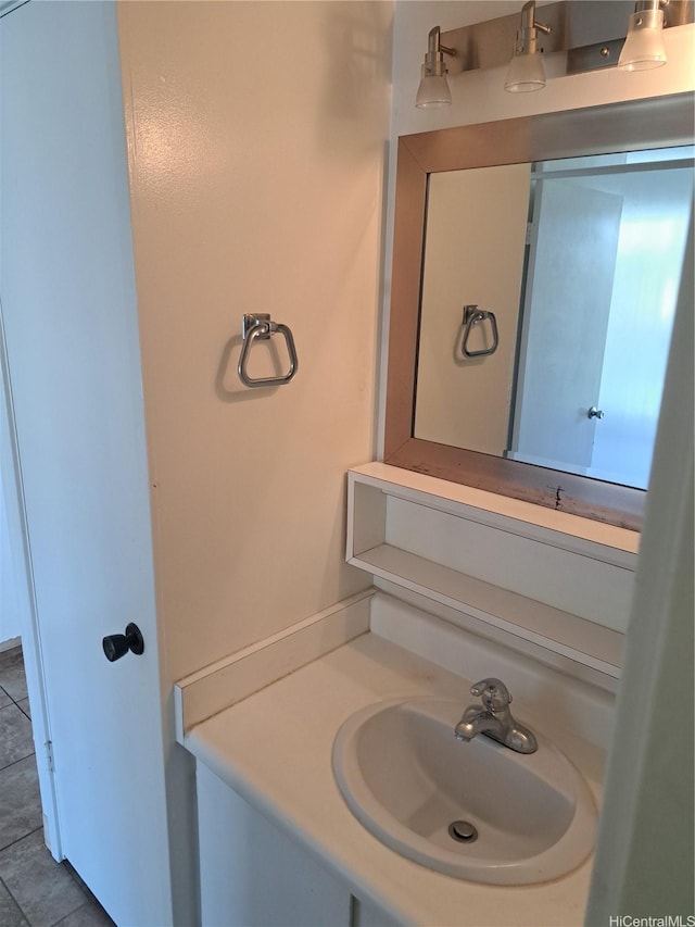 1650 Piikoi St Unit 403, Honolulu, HI 96822 - bathroom featuring vanity and tile patterned flooring