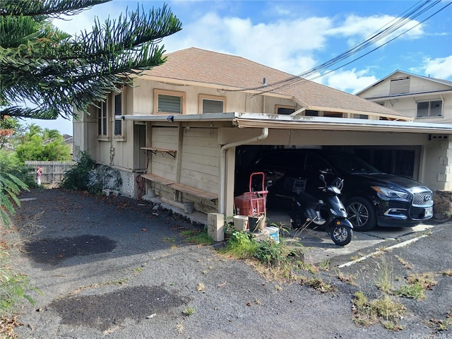 4052A Keanu St Unit A & B, Honolulu, HI 96816 - rear view of house with a shingled roof and driveway