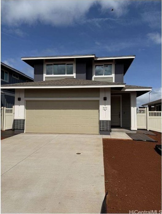 94-1140 Koakolo St Unit 110, Waipahu, HI 96797 - prairie-style home with an attached garage and driveway
