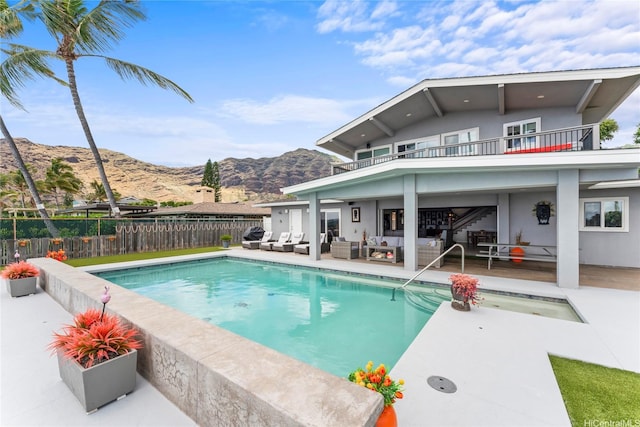84-663 Upena St, Waianae, HI 96792 - view of pool with outdoor lounge area, a mountain view, and a patio area