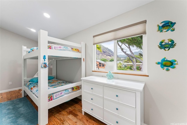 84-663 Upena St, Waianae, HI 96792 - bedroom with wood finished floors and recessed lighting
