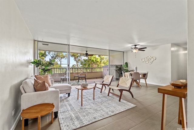 46-109 Konohiki St Unit 3922, Kaneohe, HI 96744 - living area with floor to ceiling windows and ceiling fan