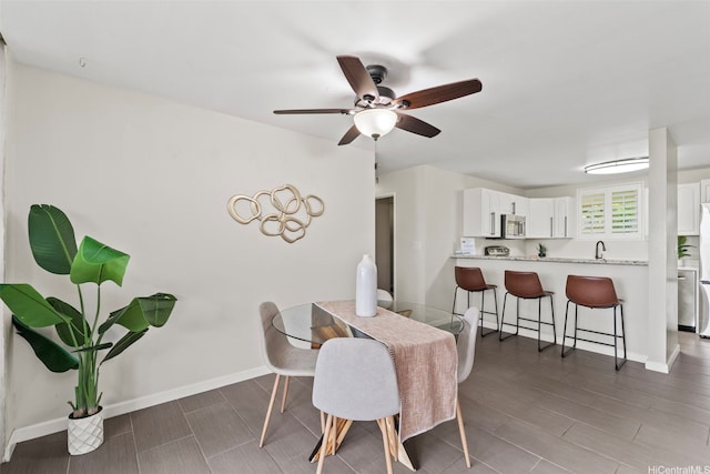 46-109 Konohiki St Unit 3922, Kaneohe, HI 96744 - dining space with a ceiling fan and baseboards